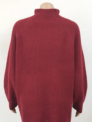 Deep Red ribbed knit cocoon turtleneck dress with raglan sleeves.