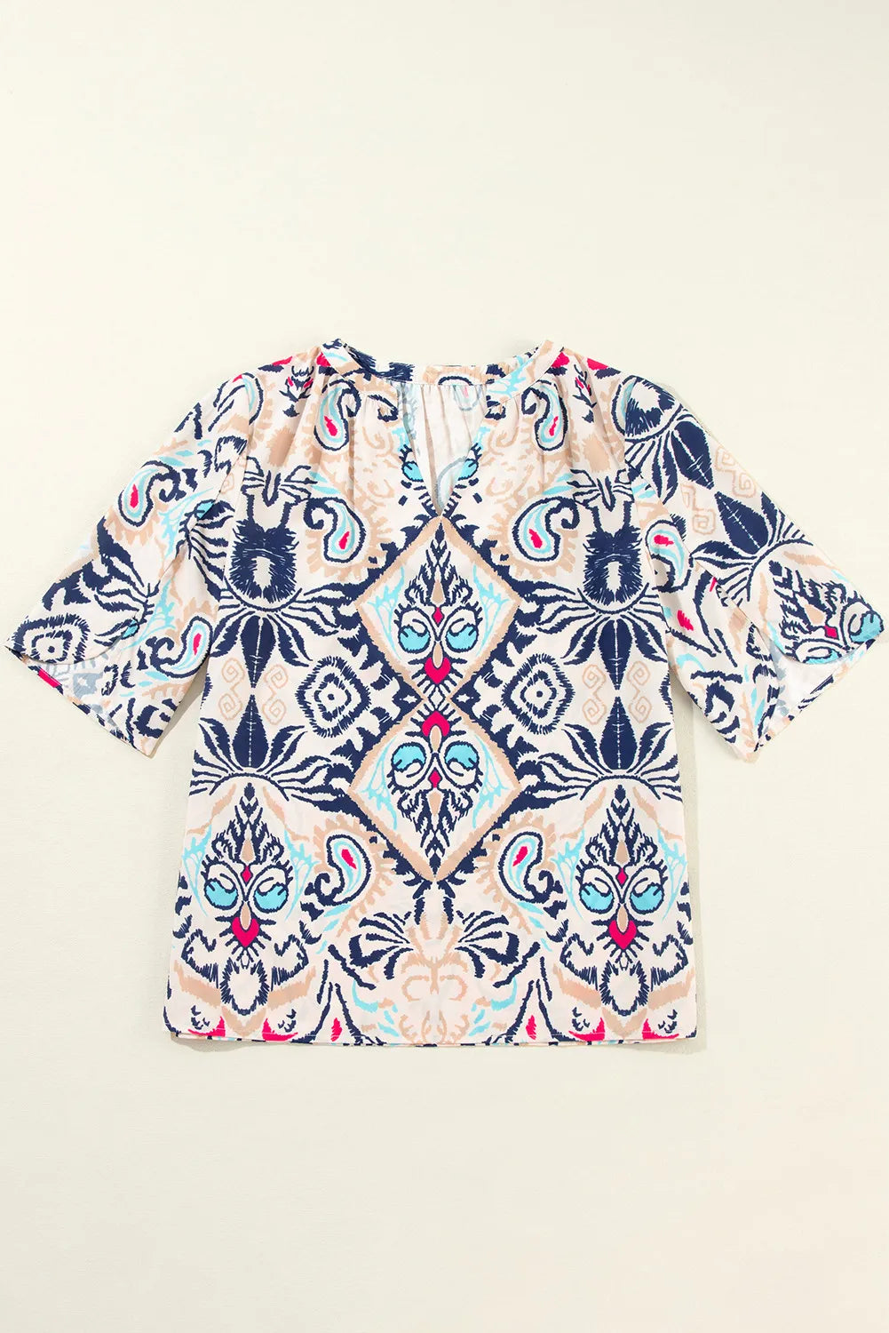 Paisley print ivory blouse with slit sleeves and V-neck