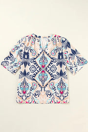 Paisley print ivory blouse with slit sleeves and V-neck