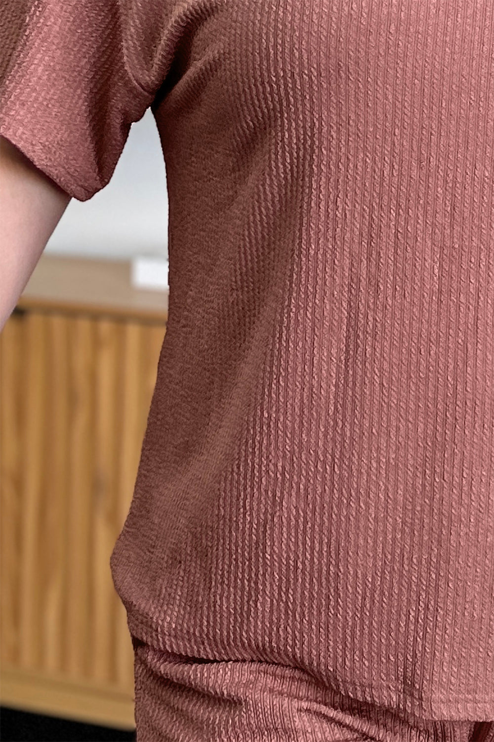 Reverie Round Set outfit set in light mauve with textured fabric and short sleeves.