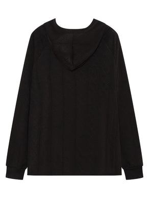 Black textured knit raglan hoodie with a subtle diagonal pattern.