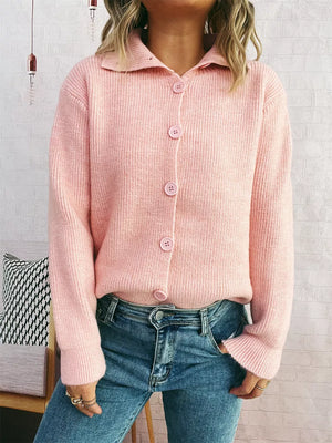 Pink ribbed cardigan with polo collar and button-up front.