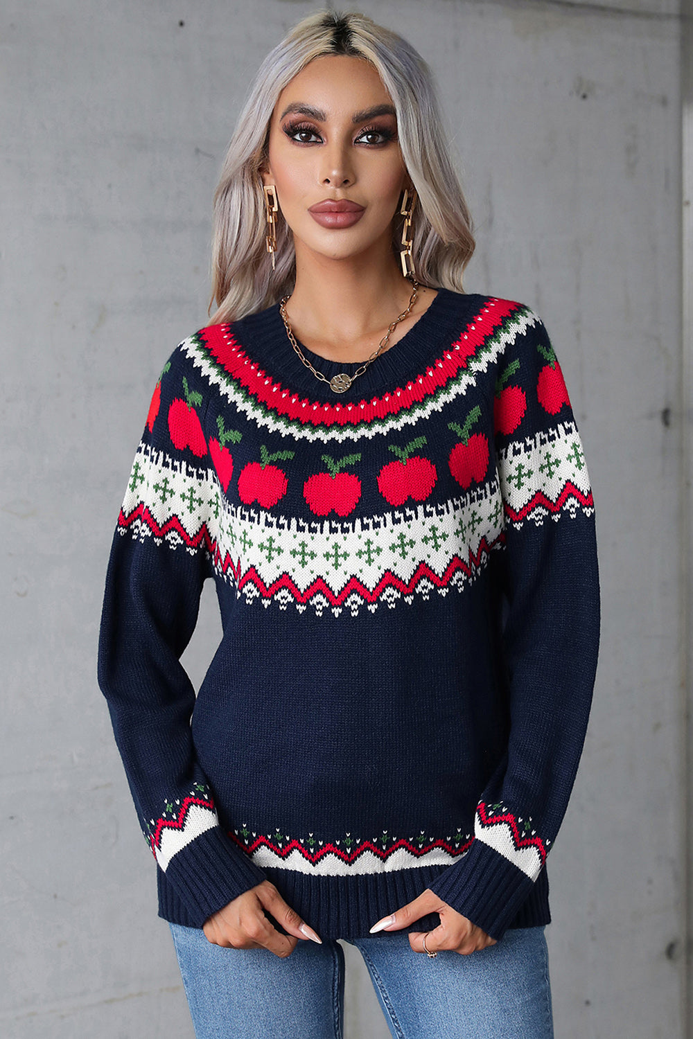 Dark blue acrylic sweater with festive Fair Isle apple motif, crew neck, long sleeves.