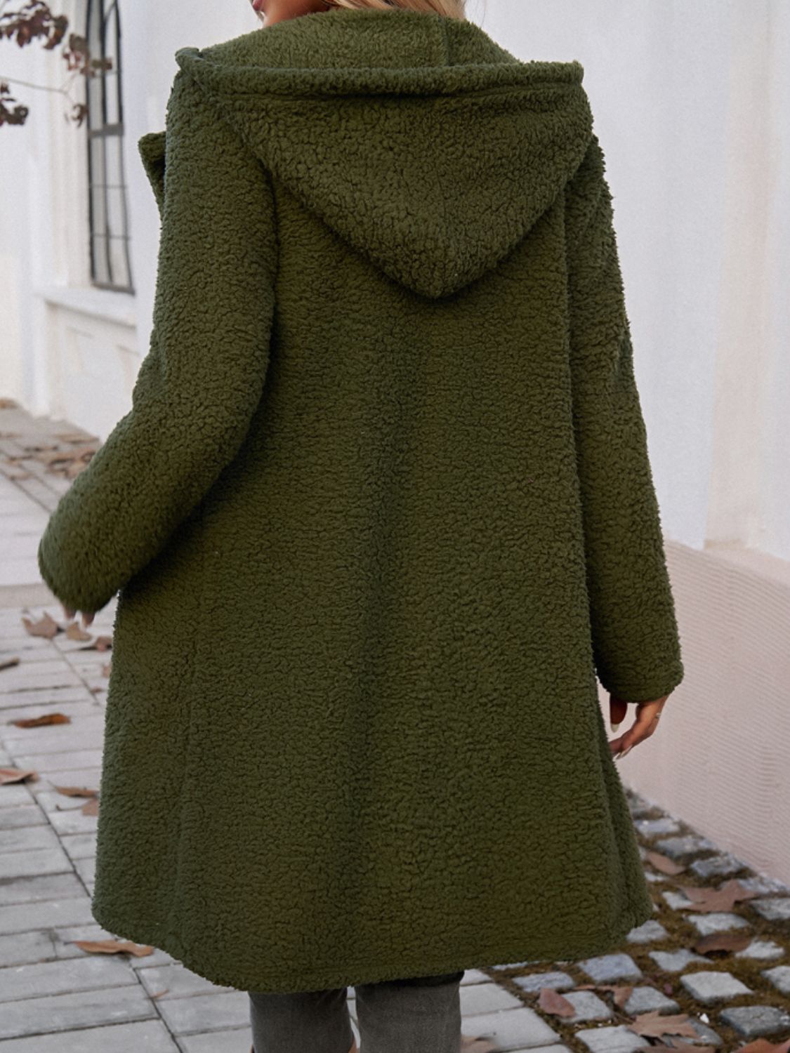 Olive green teddy hooded cocoon coat with fuzzy texture and relaxed fit.