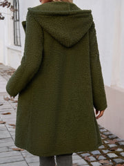 Olive green teddy hooded cocoon coat with fuzzy texture and relaxed fit.