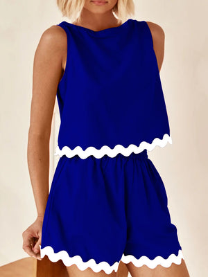 Royal blue scalloped edge tank and short co-ord set with white trim.