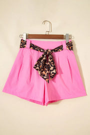 Pink chino shorts with high waist and leopard print belt detail
