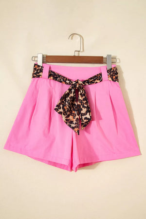 Pink chino shorts with high waist and leopard print belt detail