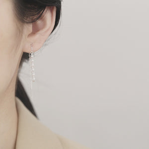 Elegant sterling silver threader earrings with delicate chain tassels.