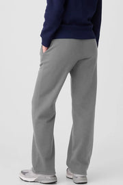 Relaxed-fit lounge trousers in dark gray with pockets and a drawstring waist.