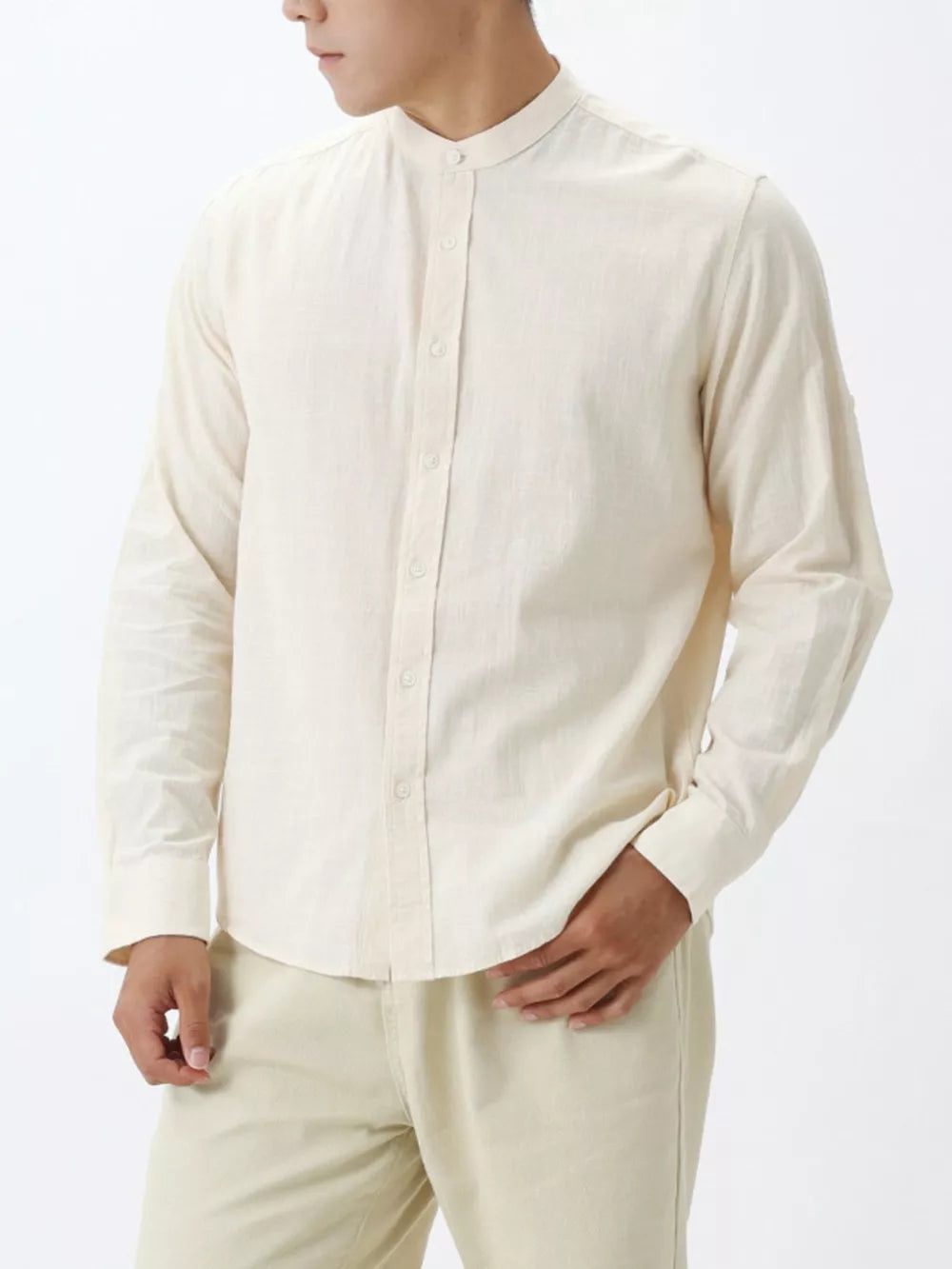 Men's light apricot 100% cotton mandarin collar shirt with button-down front.