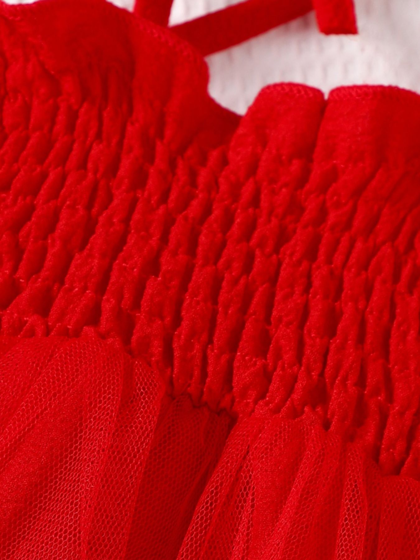 Red smocked bodysuit dress with tulle skirt detail