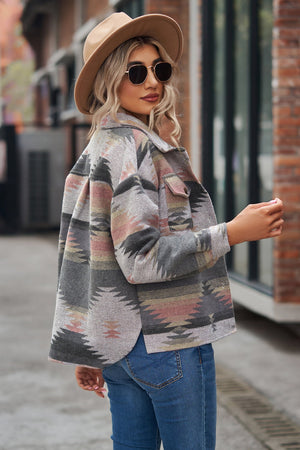 Southwestern print overshirt jacket in gray with pink and tan geometric pattern, button front, and chest pockets.