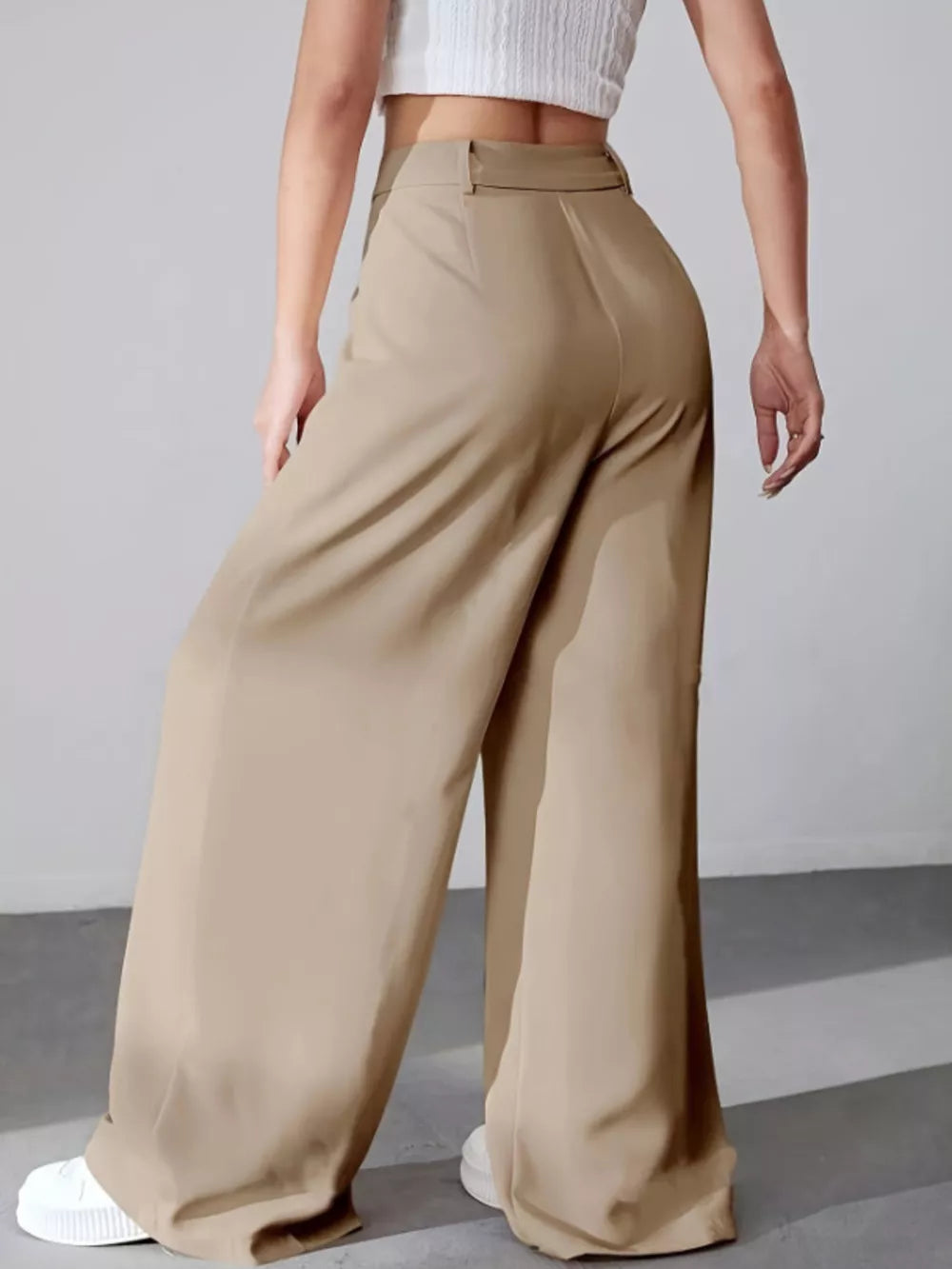Khaki high-waisted pleated wide-leg maternity trousers with a button-down detail.