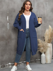 Oversized dark blue knit duster cardigan with patch pockets and long sleeves.