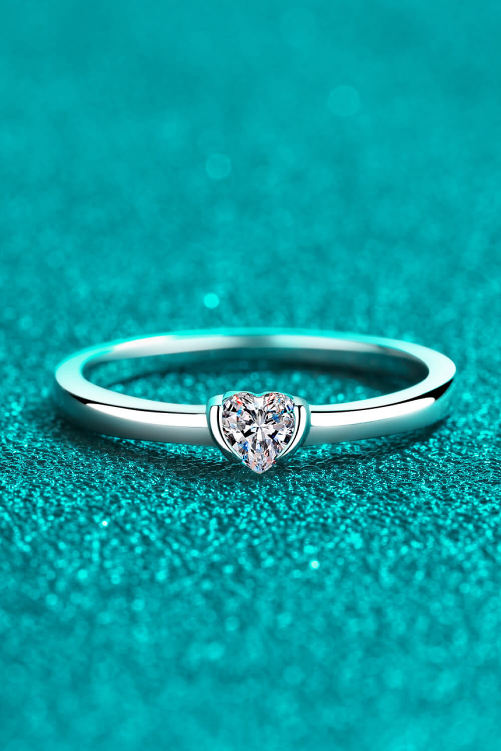 Silver ring with a heart-cut solitaire diamond engagement ring