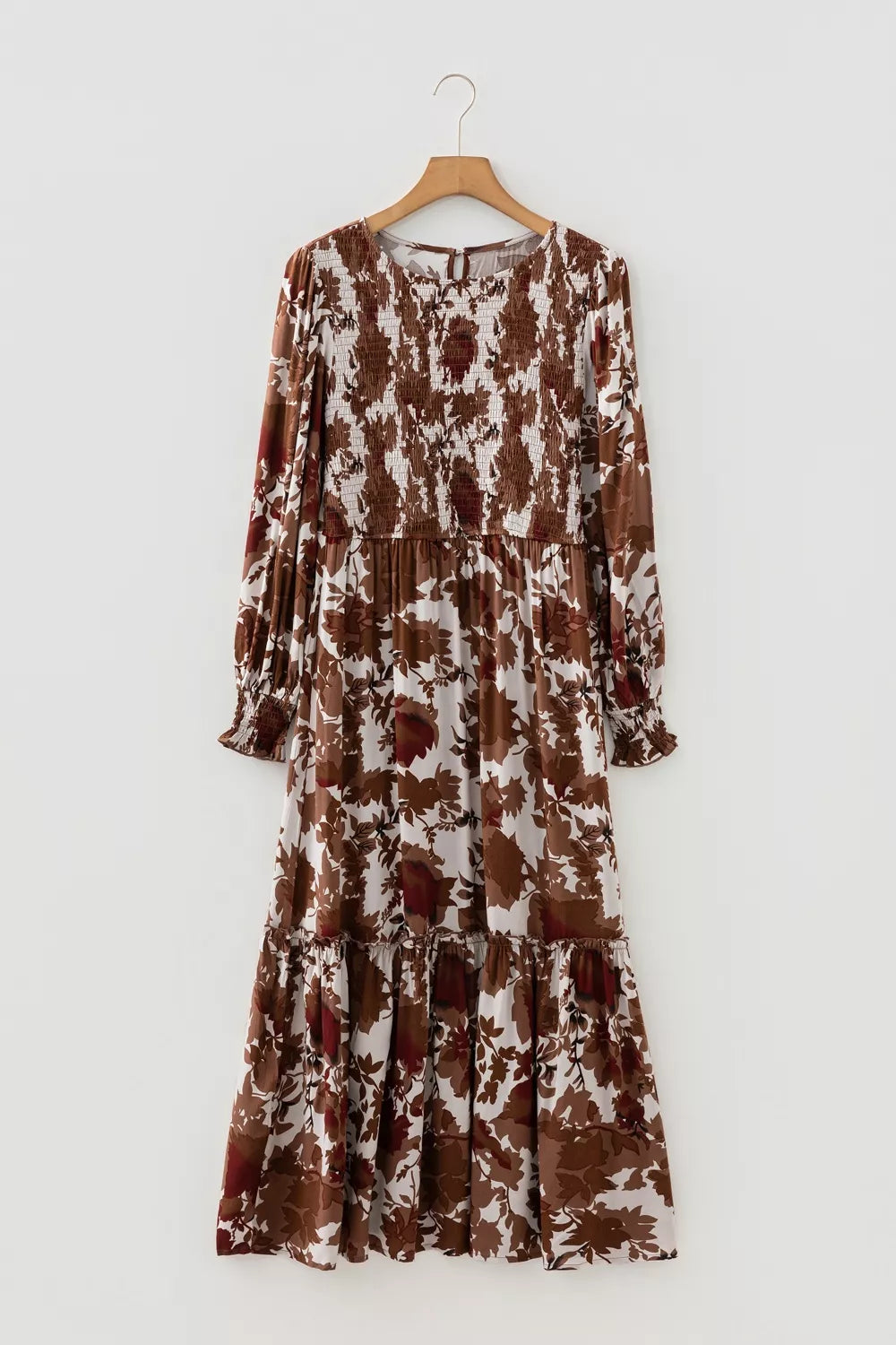 Brown floral maxi dress with smocked bodice and billowy sleeves
