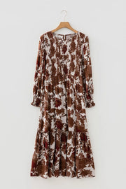 Brown floral maxi dress with smocked bodice and billowy sleeves