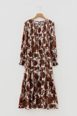 Brown floral maxi dress with smocked bodice and billowy sleeves