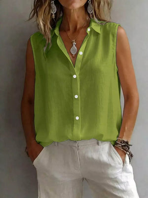 Effortless sleeveless button-up shirt in matcha green with a collared neckline and white buttons.