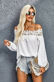 White off-shoulder blouse with lace yoke and balloon sleeves