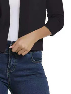 Black open-front cropped cardigan with elbow sleeves and ribbed cuffs.