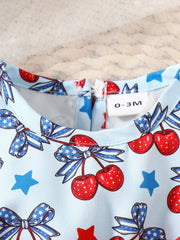 Baby one-piece with cherry and bow print, blue with red accents, cotton fabric.