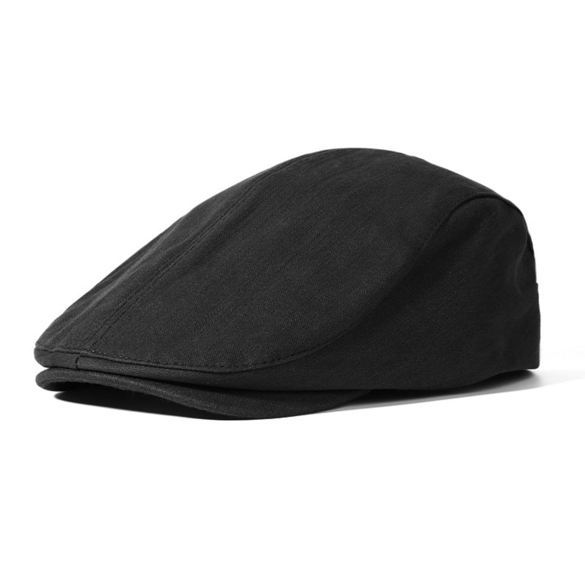 Black cotton newsboy cap with a classic flat cap silhouette and subtle stitching detail.