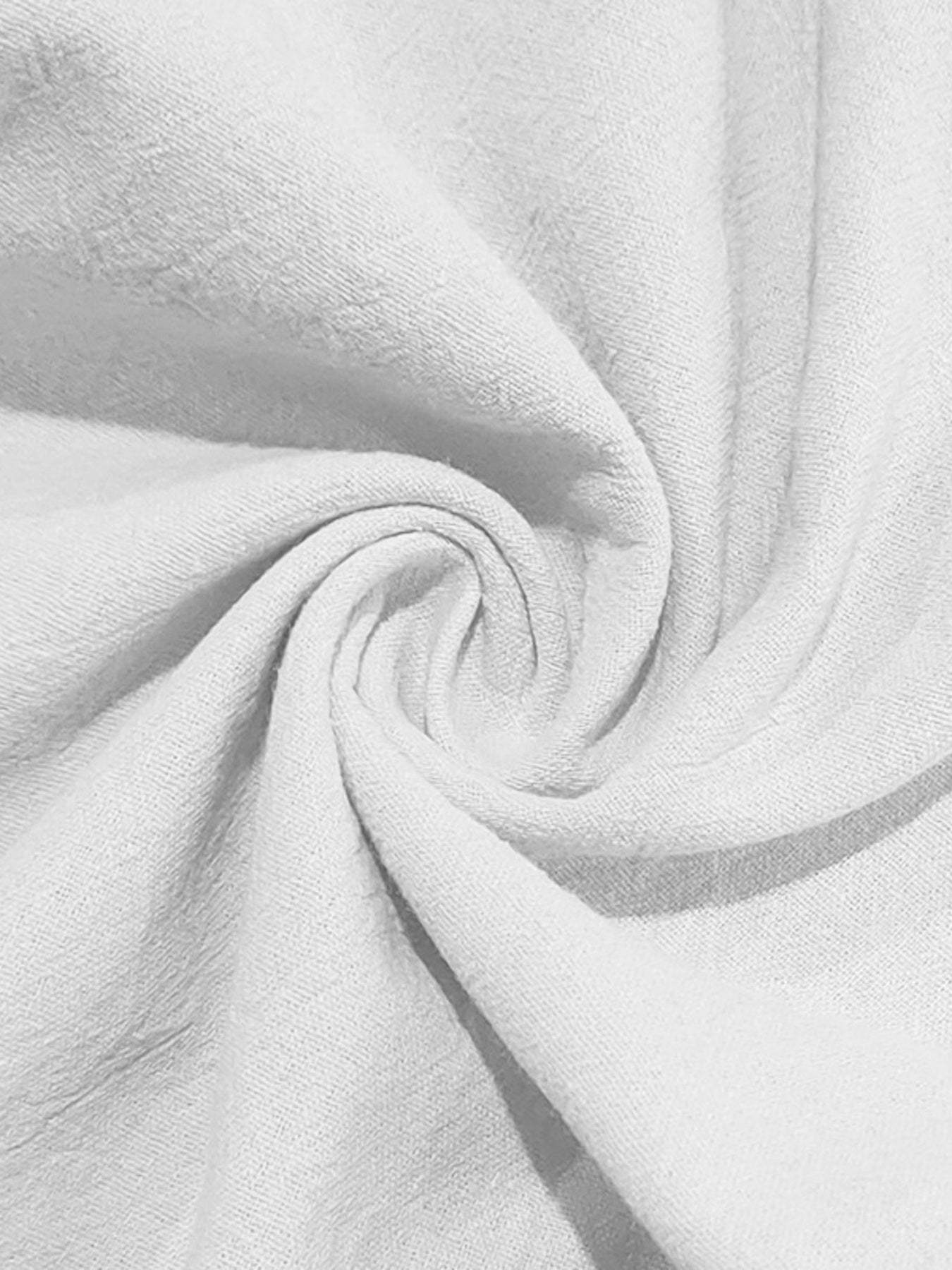 White sweatpants with drawstring detail and textured fabric