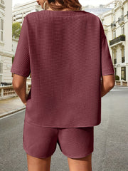 Burgundy waffle knit drawstring co-ord set with short sleeves and shorts.