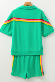 Green activewear set with rainbow stripe detail on top and shorts