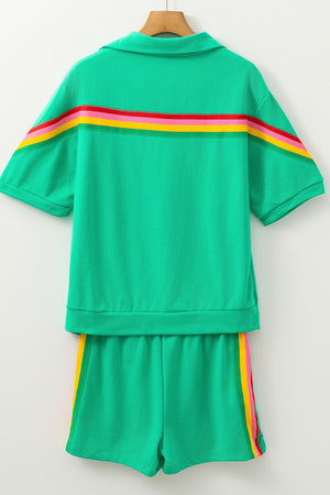 Green activewear set with rainbow stripe detail on top and shorts
