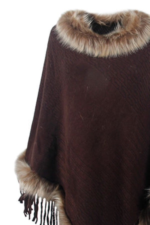 Chocolate textured knit poncho with faux fur trim and fringe detail