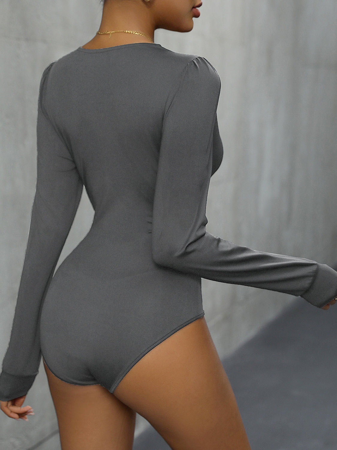 Dark Gray long sleeve bodysuit with puffed shoulders and lace trim detail.