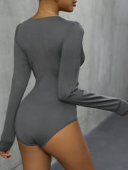 Dark Gray long sleeve bodysuit with puffed shoulders and lace trim detail.