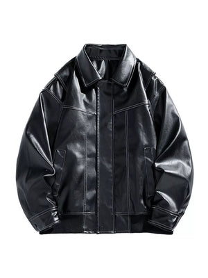 Black oversized leather bomber jacket with white contrast stitching and zip-up front.