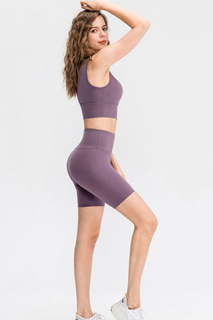 Mauve high-waist performance bike shorts with a seamless design.