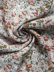 Floral smocked bodice wide leg jumpsuit in dusty pink and light blue floral print fabric.