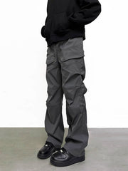 Men's gray pocketed sweatpants with a relaxed fit and casual style.