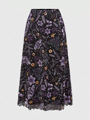 Black midi skirt with a whimsical floral and butterfly print and scalloped hem
