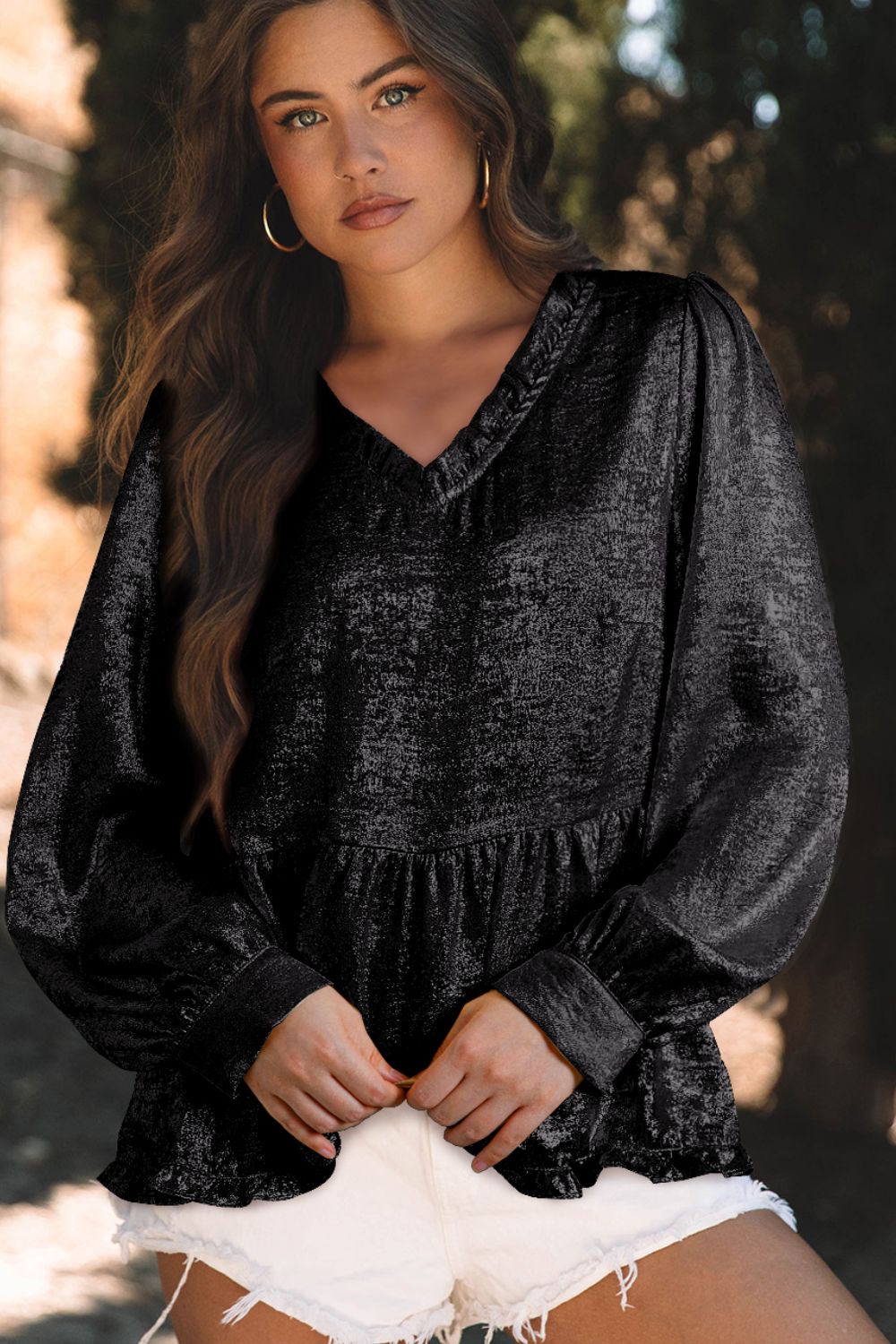 Black metallic blouse with gathered sleeves and V-neck