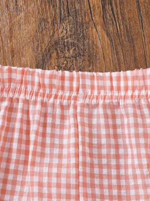 Baby gingham ruffle shorts in pink cotton with elastic waist