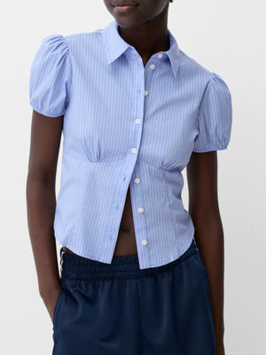 Light blue striped puff sleeve fitted button-up shirt with a collared neckline.