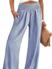 Blue gingham smocked high-waist wide-leg pants with pockets.