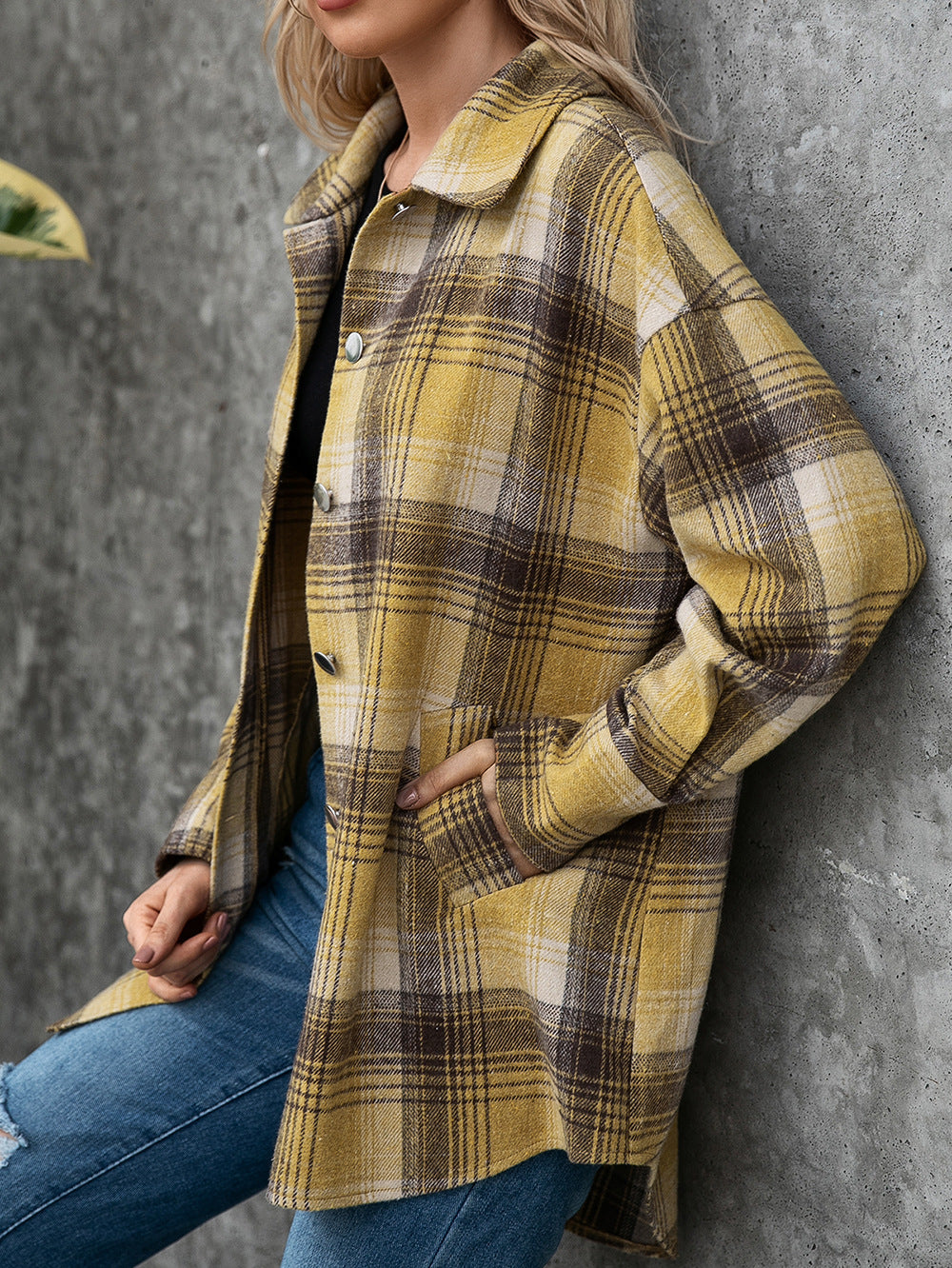 Oversized plaid shacket with patch pockets and button front.