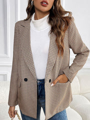 Houndstooth double-breasted blazer in camel with black buttons and flap pockets.