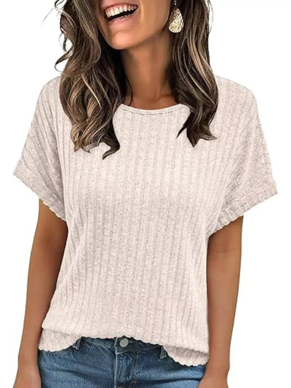 Ribbed knit t-shirt in light beige with short sleeves and a crew neck.