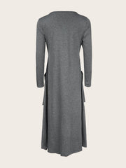 Dark gray midi dress with long sleeves, asymmetrical tiered hem, and pockets.