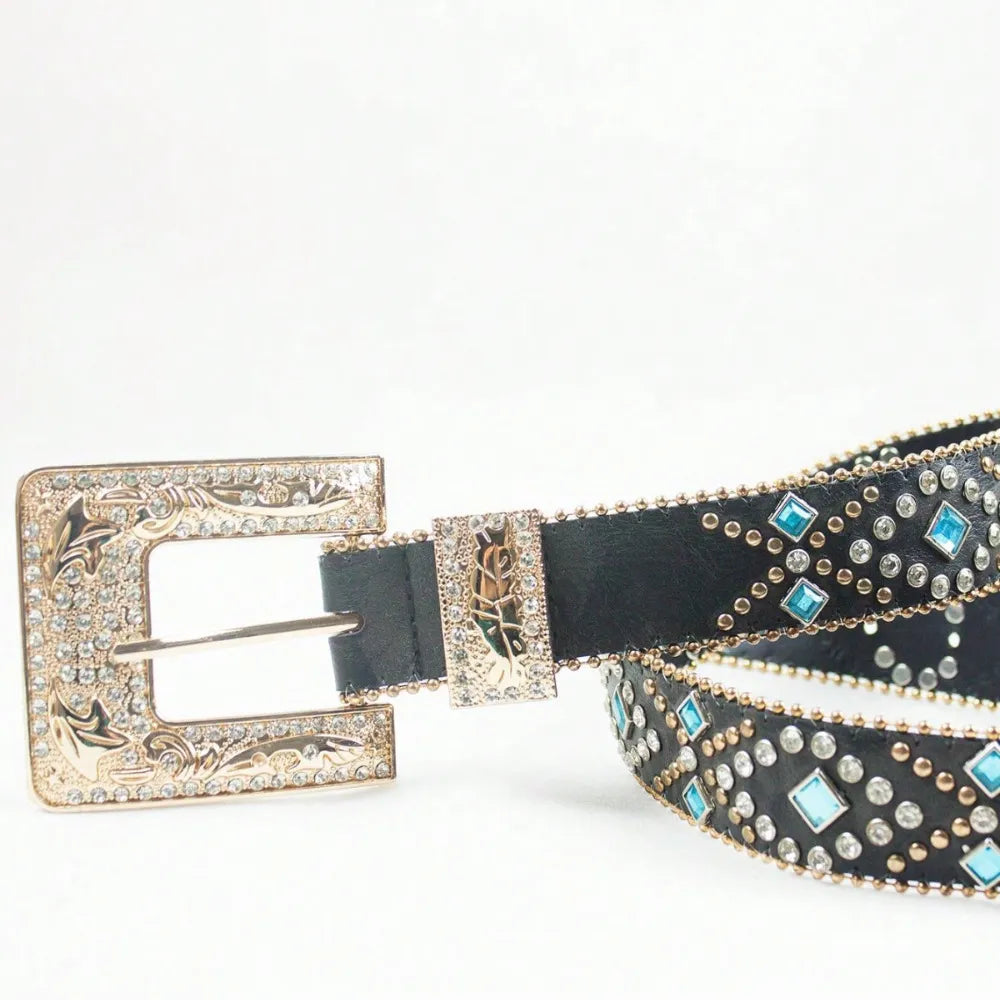 Black leather belt with ornate silver buckle, rhinestones and blue gem accents