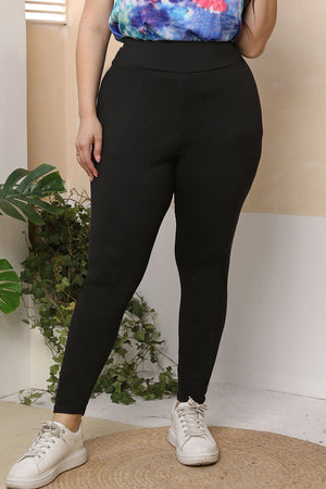 Black textured sculpting leggings with a high waist